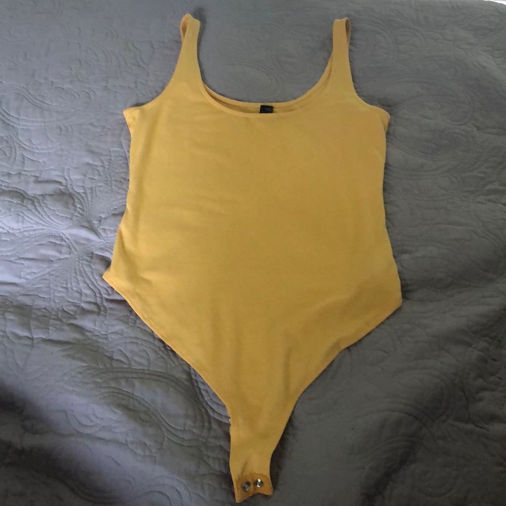 Yellow body suit